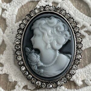 CAMEO, black and white beautiful face, crystals surrounding the oval frame